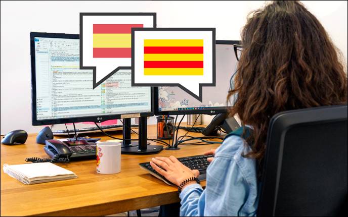 Traductor de catalan trabajando en la traducción de español a catalan de un documento. 